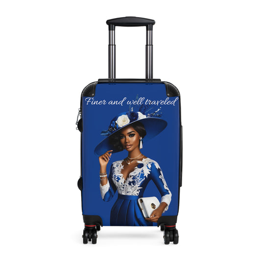 Finer and Well Traveled Suitcase